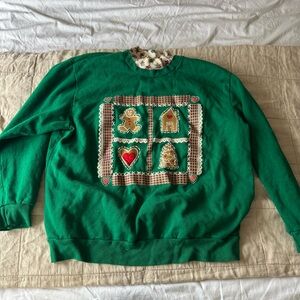 Green Holiday Sweater with Festive Patchwork